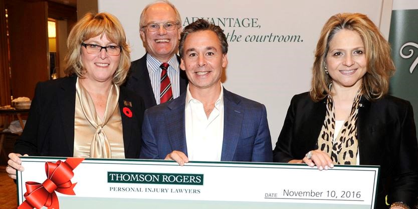 Thomson Rogers 80th Anniversary Cheque to Spinal Cord Injury Ontario