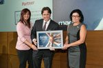 Ian Furlong, personal injury lawyer, accepts award on behalf of PIA Law for its support of MADD Canada.