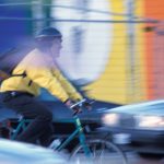 cyclist driving in traffic