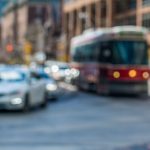 toronto intersection with cyclist car and streetcar