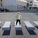 boy standing on 3d crosswalk