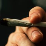 hand of cannabis smoker