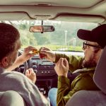 driver and passenger smoking marijuana in car