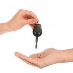 handing over car keys to someone else